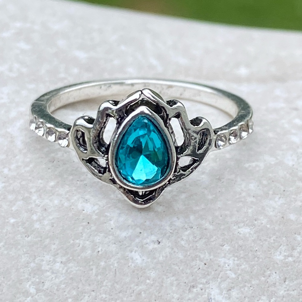 Lotus ring blue zircon silver plated with crystal accent sz 7